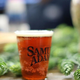 Close-up of Samuel Adams beer in plastic cup